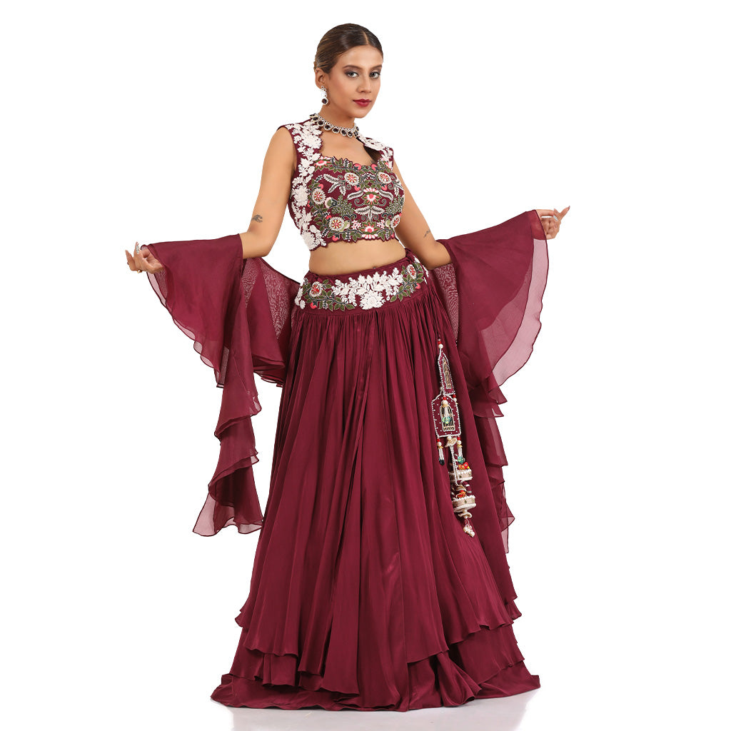 A woman wearing Wine Three Layered Drape Skirt Set.