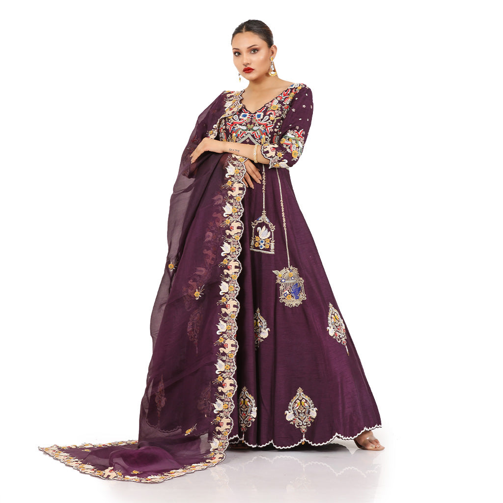 A woman wearing Wine Colored Pinjra Anarkali Dress with Dupatta.