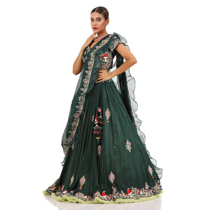 A woman wearing Bottle Green Mushroom Colored Lehenga.