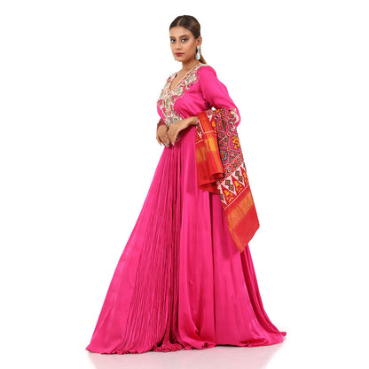 A woman wearing Fuchsia Gathered Anarkali Suit with Dupatta.