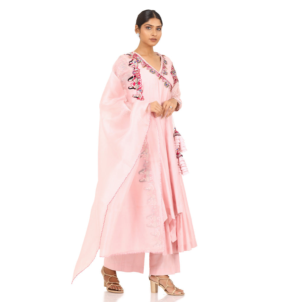 A woman wearing Designer Pink Doll Angrakha Dress.