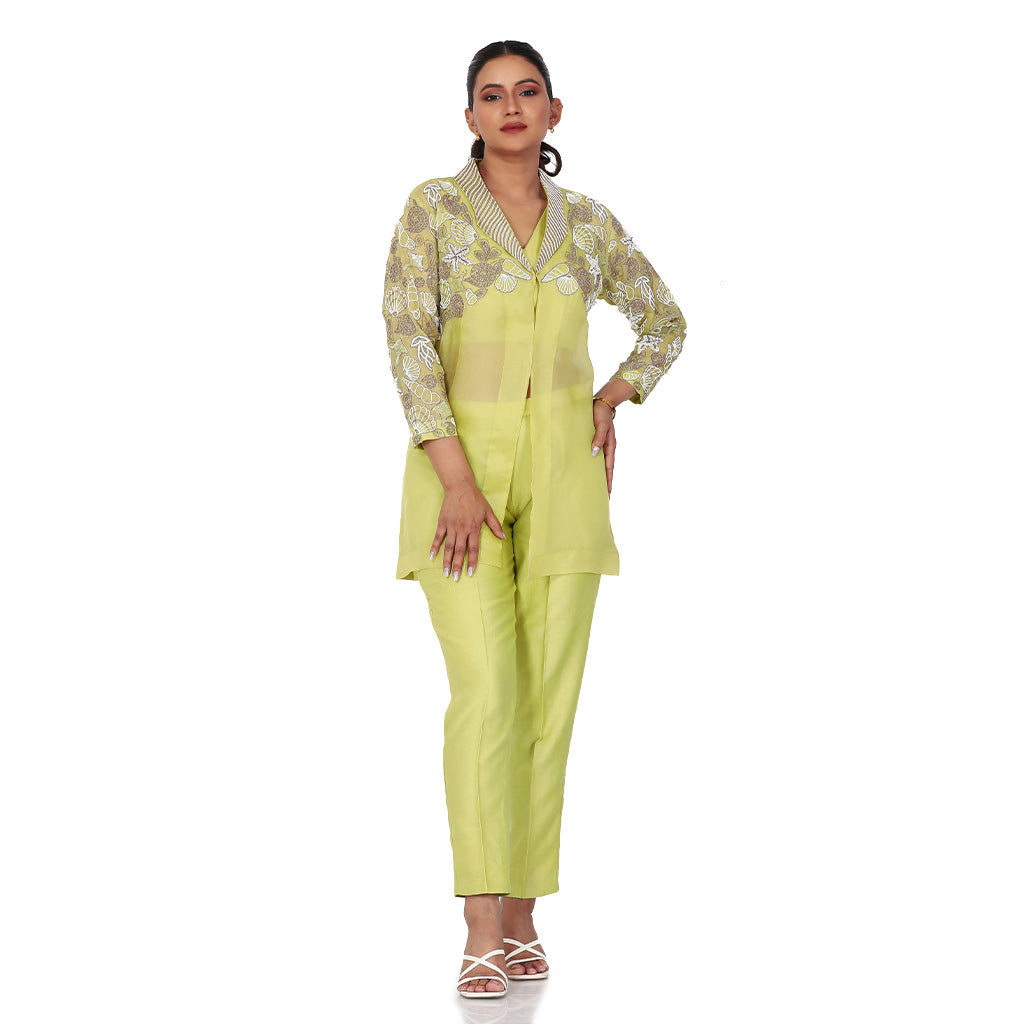 A woman standing and wearing lemon colored Starfish Co-Ord Set.