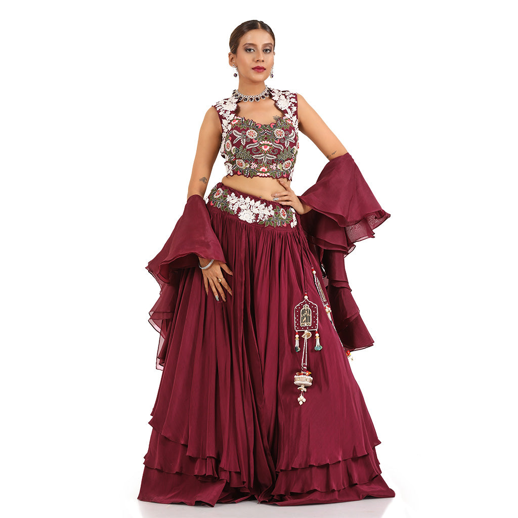 A woman wearing Wine Three Layered Drape Skirt Set.