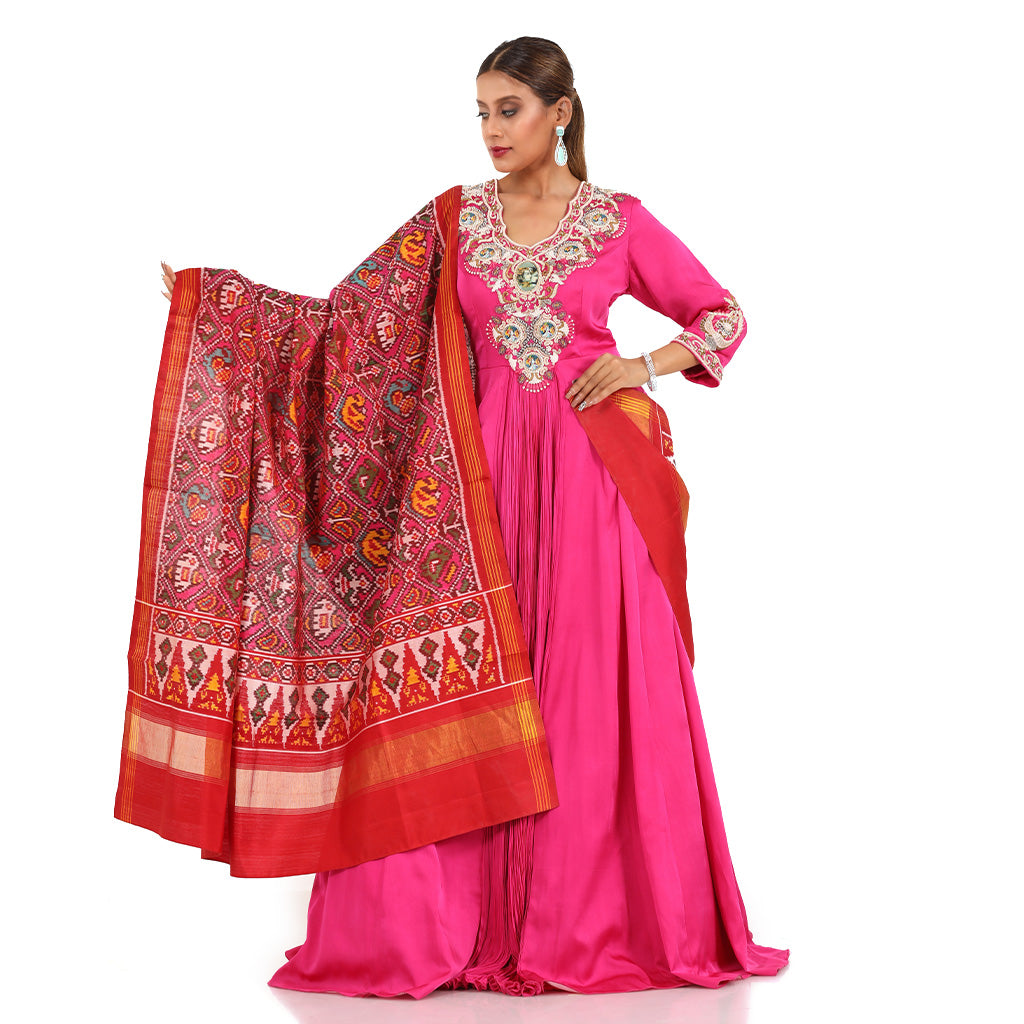 A woman wearing Fuchsia Gathered Anarkali Suit with Dupatta.