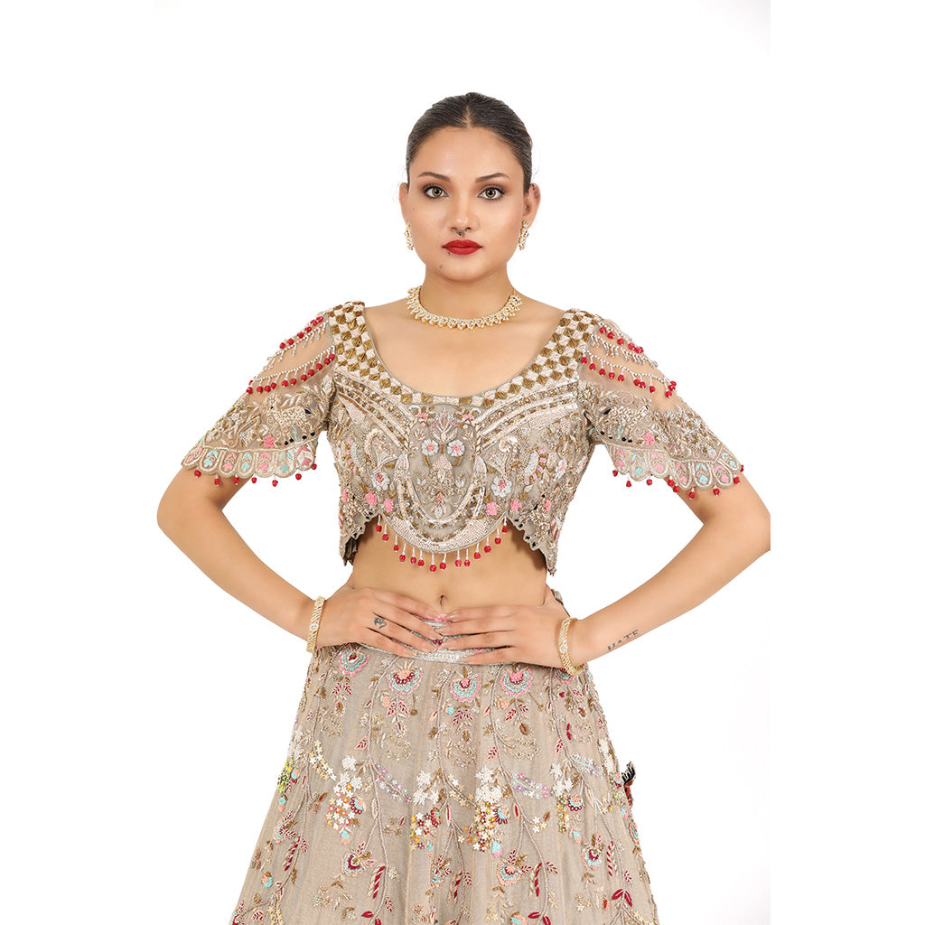 A woman standing and wearing Panda Lehenga Set.