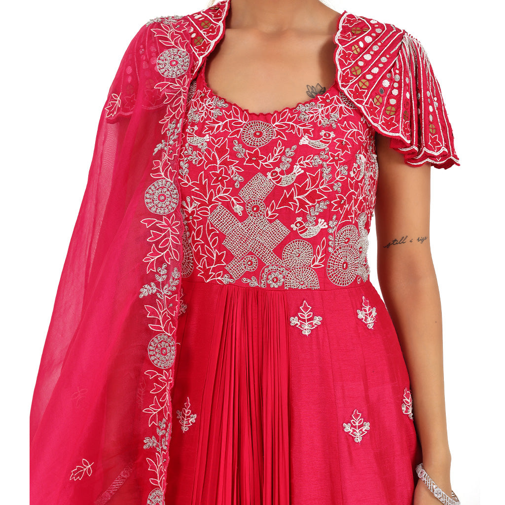 A woman wearing Fuchsia Umbrella Anarkali Suit with Dupatta.