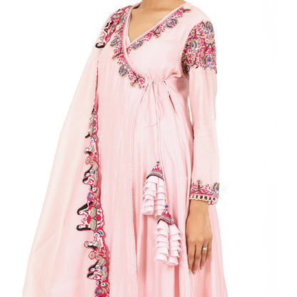 A woman wearing Designer Pink Doll Angrakha Dress.