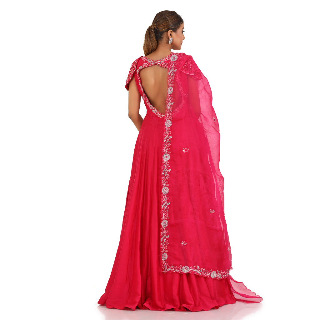 A woman wearing Fuchsia Umbrella Anarkali Suit with Dupatta.