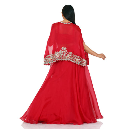  A woman wearing Crimson Red Organza Poncho with Skirt.