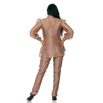 A woman standing and wearing brown colored Mocha Circle Co-Ord Set.