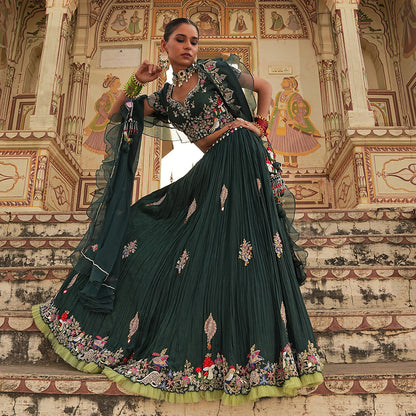 A woman wearing Bottle Green Mushroom Colored Lehenga.