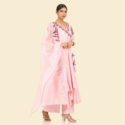 A woman wearing Designer Pink Doll Angrakha Dress.