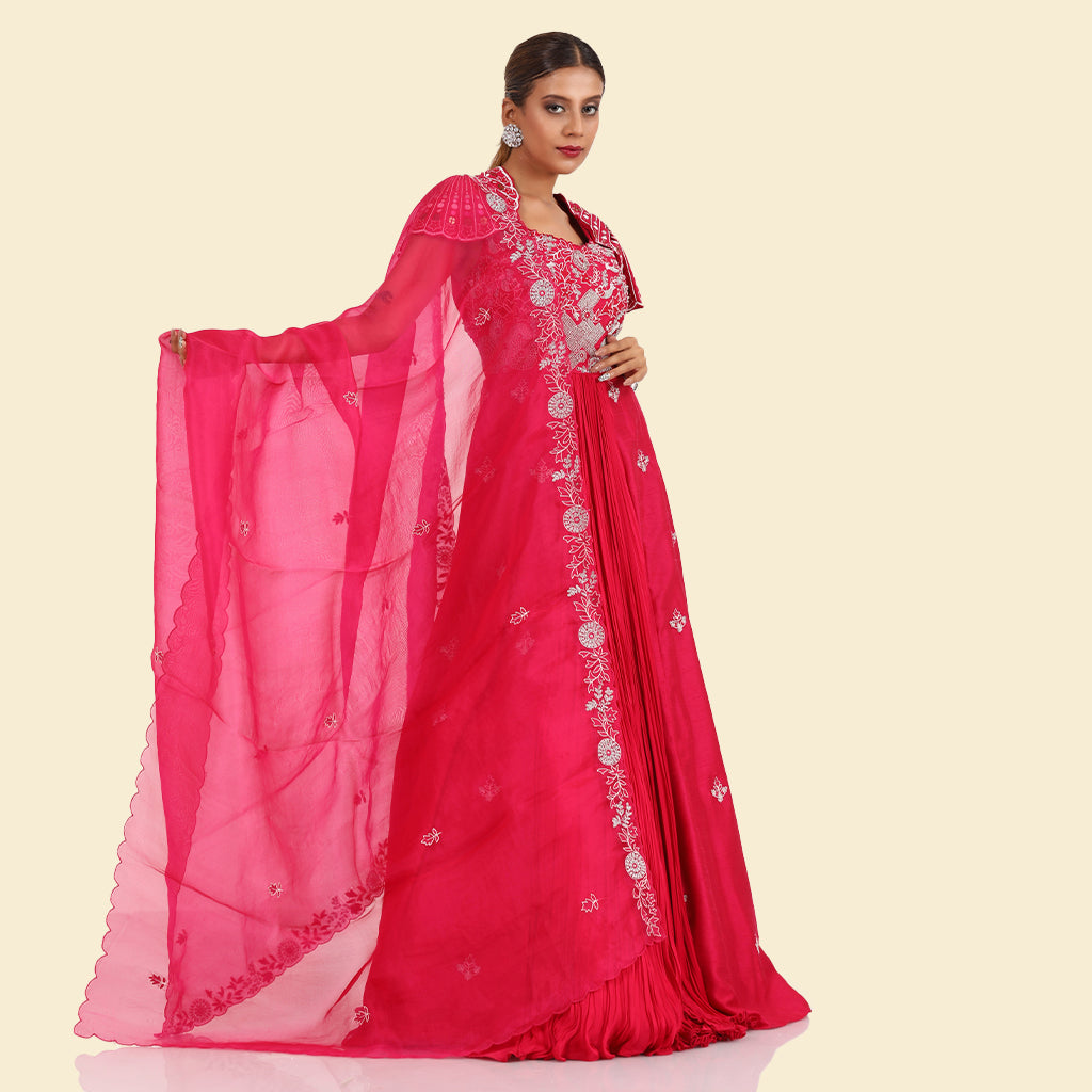 A woman wearing Fuchsia Umbrella Anarkali Suit with Dupatta.