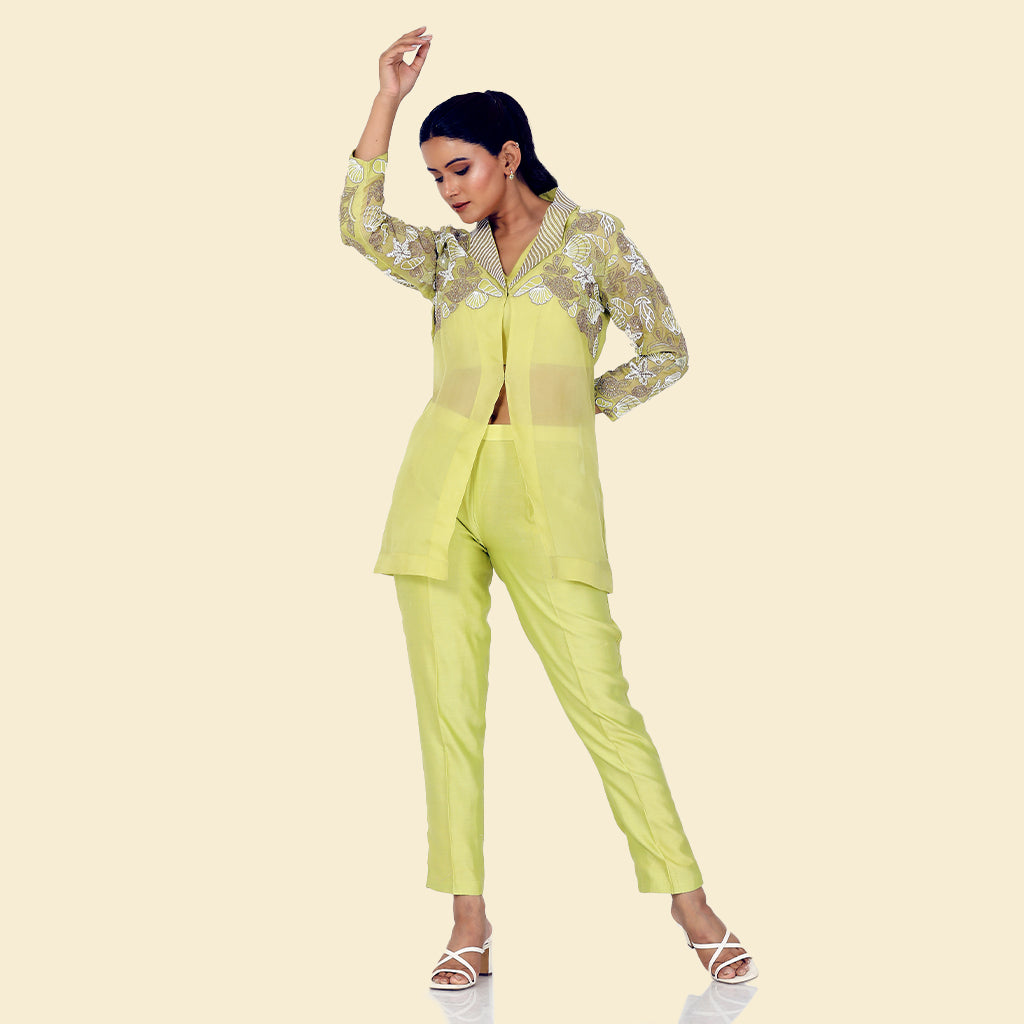 A woman standing and wearing lemon colored Starfish Co-Ord Set.