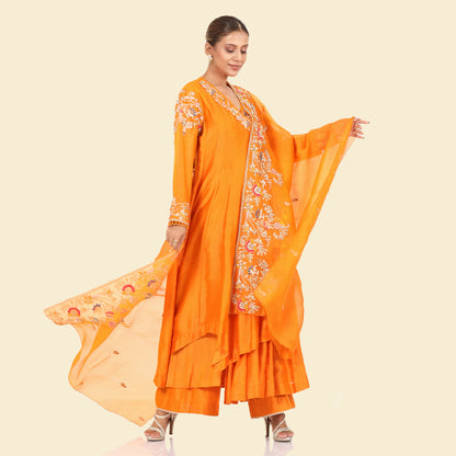 A woman wearing Designer Orange Dori Angrakha Dress.